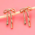 Gold Whisper Bow Earrings